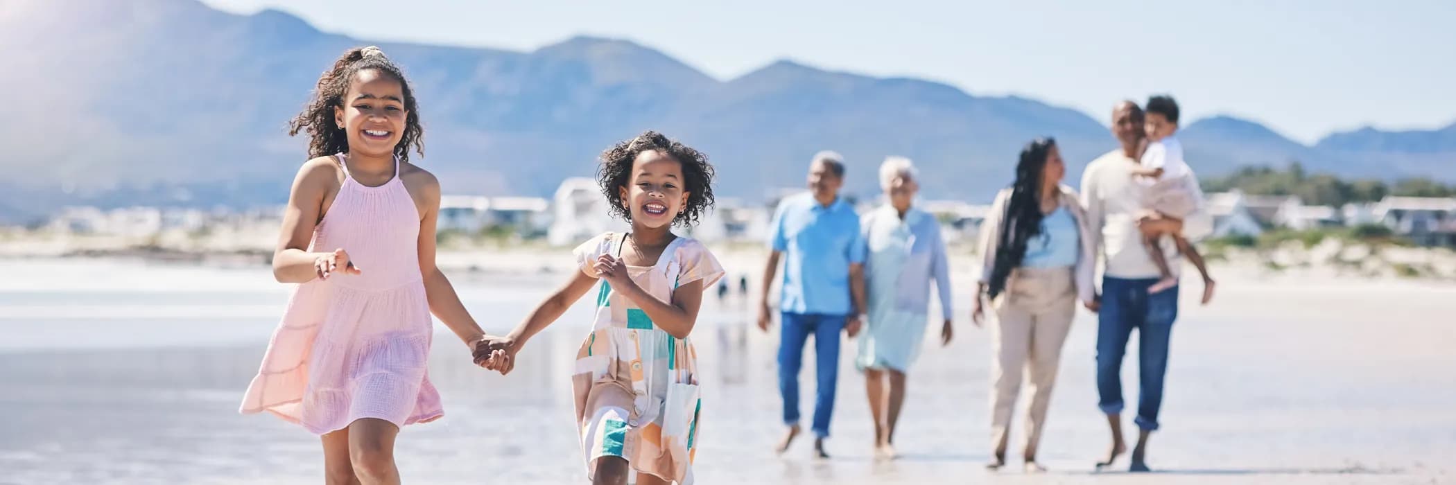 Large Family Holidays - Multigenerational family on beach