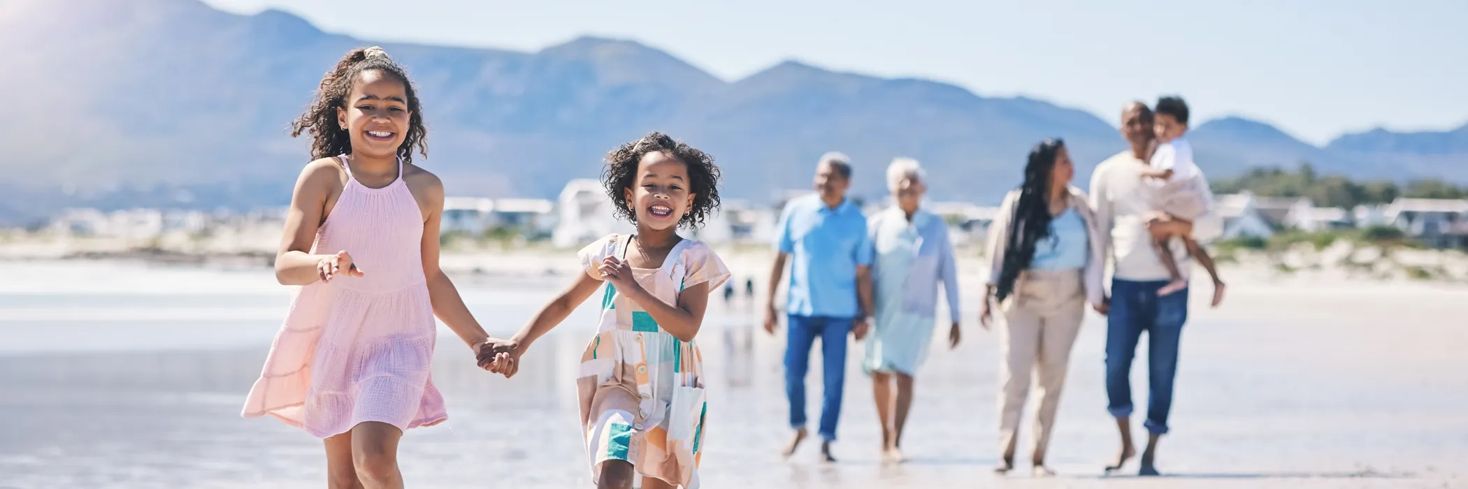 Large Family Holidays - Multigenerational family on beach